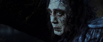 Movie still from “Pirates of the Caribbean: Dead Men Tell No Tales” (2017), directed by Espen Sandberg – A man's face with a creepy look; Close Up shot, Low angle