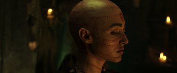 Movie still from “Pirates of the Caribbean: Dead Men Tell No Tales” (2017), directed by Espen Sandberg – A woman with a baseball bat on her face; Close Up shot, Low angle