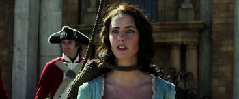 Movie still from “Pirates of the Caribbean: Dead Men Tell No Tales” (2017), directed by Espen Sandberg – A woman with a rope tied to her neck; Close Up shot, Low angle