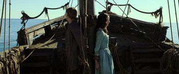 Movie still from “Pirates of the Caribbean: Dead Men Tell No Tales” (2017), directed by Espen Sandberg – Two people standing next to each other on a boat; Wide shot, Low angle