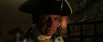 Movie still from “Pirates of the Caribbean: Dead Men Tell No Tales” (2017), directed by Espen Sandberg – A person wearing a hat; Close Up shot, Low angle