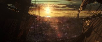 Movie still from “Pirates of the Caribbean: Dead Men Tell No Tales” (2017), directed by Espen Sandberg – The sun is setting over a city filled with lots of lights; Extreme Wide shot, High angle