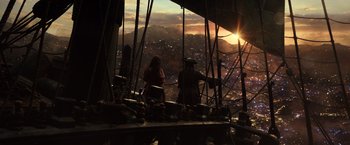 Movie still from “Pirates of the Caribbean: Dead Men Tell No Tales” (2017), directed by Espen Sandberg – Two people standing on top of a ship looking at the sky; Extreme Wide shot, High angle