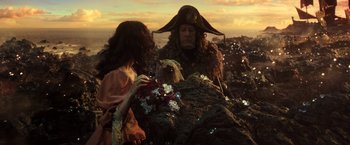 Movie still from “Pirates of the Caribbean: Dead Men Tell No Tales” (2017), directed by Espen Sandberg – A man and a woman dressed as pirates; Medium shot, Over the shoulder angle