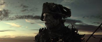 Movie still from “Pirates of the Caribbean: Dead Men Tell No Tales” (2017), directed by Espen Sandberg – A man in a pirate costume with a hat on his head; Close Up shot, Low angle