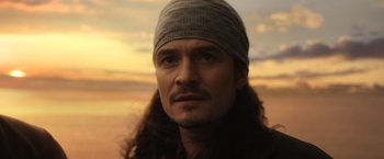 Movie still from “Pirates of the Caribbean: Dead Men Tell No Tales” (2017), directed by Espen Sandberg – A person with long hair wearing a hat; Close Up shot, Low angle