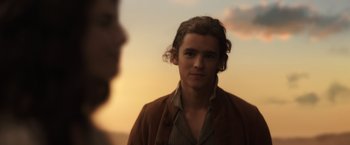 Movie still from “Pirates of the Caribbean: Dead Men Tell No Tales” (2017), directed by Espen Sandberg – A man with long hair is standing in front of another man; Close Up shot, Over the shoulder angle