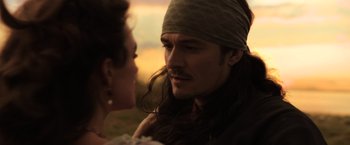 Movie still from “Pirates of the Caribbean: Dead Men Tell No Tales” (2017), directed by Espen Sandberg – A man and a woman are looking at one another; Close Up shot, Over the shoulder angle