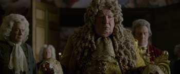 Movie still from “Pirates of the Caribbean: On Stranger Tides” (2011), directed by Rob Marshall – An older man in a wig and a wig; Medium shot, Over the shoulder angle