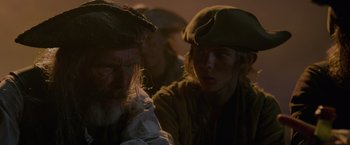 Movie still from “Pirates of the Caribbean: On Stranger Tides” (2011), directed by Rob Marshall – Two people in hats are talking to each other; Close Up shot, Over the shoulder angle