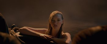 Movie still from “Pirates of the Caribbean: On Stranger Tides” (2011), directed by Rob Marshall – A beautiful young woman with wet hair posing for a picture; Close Up shot, Over the shoulder angle