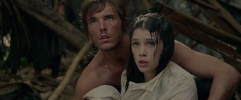 Movie still from “Pirates of the Caribbean: On Stranger Tides” (2011), directed by Rob Marshall – A man standing next to a woman in a field; Close Up shot, Low angle