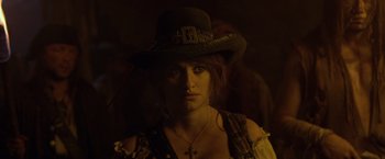 Movie still from “Pirates of the Caribbean: On Stranger Tides” (2011), directed by Rob Marshall – A person wearing a hat; Close Up shot, Over the shoulder angle