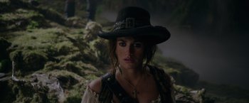 Movie still from “Pirates of the Caribbean: On Stranger Tides” (2011), directed by Rob Marshall – A person wearing a hat; Close Up shot, Over the shoulder angle