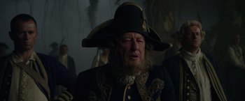 Movie still from “Pirates of the Caribbean: On Stranger Tides” (2011), directed by Rob Marshall – A person wearing a hat; Close Up shot, Low angle