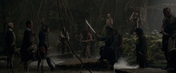 Movie still from “Pirates of the Caribbean: On Stranger Tides” (2011), directed by Rob Marshall – A group of people in the woods fighting with swords; Wide shot, High angle