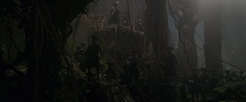Movie still from “Pirates of the Caribbean: On Stranger Tides” (2011), directed by Rob Marshall – A group of people standing around a tree; Extreme Wide shot, Low angle