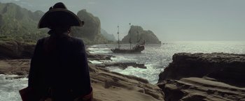 Movie still from “Pirates of the Caribbean: On Stranger Tides” (2011), directed by Rob Marshall – A pirate ship in the water; Extreme Wide shot, Over the shoulder angle