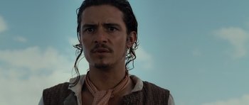 Movie still from “Pirates of the Caribbean: The Curse of the Black Pearl” (2003), directed by Gore Verbinski – A person with long hair; Close Up shot, Low angle