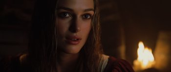 Movie still from “Pirates of the Caribbean: The Curse of the Black Pearl” (2003), directed by Gore Verbinski – A person with long hair; Close Up shot, Over the shoulder angle