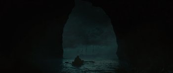 Movie still from “Pirates of the Caribbean: The Curse of the Black Pearl” (2003), directed by Gore Verbinski – A person in a boat in the middle of the night; Extreme Wide shot, High angle