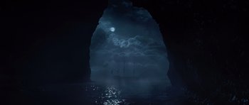 Movie still from “Pirates of the Caribbean: The Curse of the Black Pearl” (2003), directed by Gore Verbinski – A boat in the middle of the ocean at night; Extreme Wide shot, Low angle