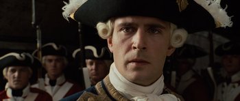 Movie still from “Pirates of the Caribbean: The Curse of the Black Pearl” (2003), directed by Gore Verbinski – A person wearing a hat; Close Up shot, Low angle