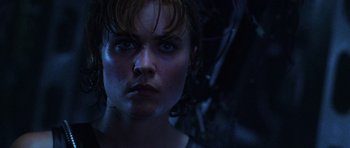 Movie still from “Pitch Black” (2000), directed by David Twohy – A person with blue eyes; Close Up shot, Low angle