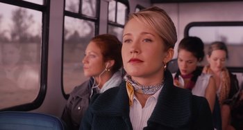 Movie still from “Pitch Perfect” (2012), directed by Jason Moore – Three women are sitting on a bus listening to music; Close Up shot, Over the shoulder angle