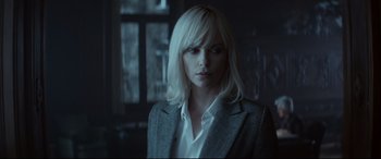 Movie still from “Atomic Blonde” (2017), directed by David Leitch – Charlize theron in the movie atomic blonde; Close Up shot, Over the shoulder angle
