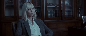 Movie still from “Atomic Blonde” (2017), directed by David Leitch – Charlize theron in the movie atomic blonde; Close Up shot, Over the shoulder angle