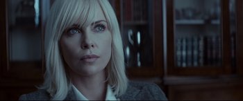 Movie still from “Atomic Blonde” (2017), directed by David Leitch – Charlize theron in the movie atomic blonde; Close Up shot, Over the shoulder angle