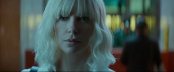 Movie still from “Atomic Blonde” (2017), directed by David Leitch – A person with white hair; Close Up shot, Low angle