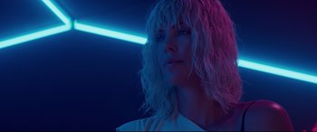 Movie still from “Atomic Blonde” (2017), directed by David Leitch – A person wearing a white shirt; Close Up shot, Low angle