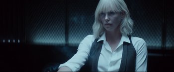 Movie still from “Atomic Blonde” (2017), directed by David Leitch – Charlize theron in atomic blonde; Medium shot, Over the shoulder angle