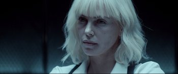 Movie still from “Atomic Blonde” (2017), directed by David Leitch – Charlize theron in atomic blonde; Close Up shot, Over the shoulder angle