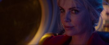 Movie still from “Atomic Blonde” (2017), directed by David Leitch – A woman's face in front of a mirror; Close Up shot, Over the shoulder angle