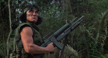 Movie still from “Predator” (1987), directed by John McTiernan – Medium shot, Low angle