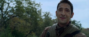 Movie still from “Predators” (2010), directed by Nimród Antal – A person wearing a jacket; Close Up shot, Over the shoulder angle