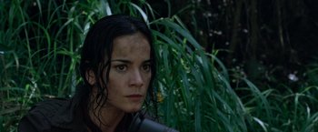 Movie still from “Predators” (2010), directed by Nimród Antal – A person with wet hair; Close Up shot, High angle