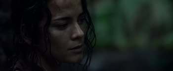 Movie still from “Predators” (2010), directed by Nimród Antal – A person with wet hair; Close Up shot, Low angle