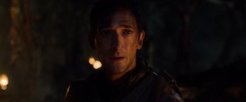 Movie still from “Predators” (2010), directed by Nimród Antal – A person wearing a jacket; Close Up shot, Over the shoulder angle