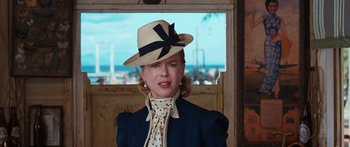Movie still from “Australia” (2008), directed by Baz Luhrmann – A woman wearing a hat with a bow on it; Close Up shot, Over the shoulder angle
