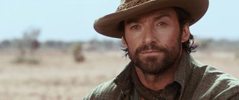 Movie still from “Australia” (2008), directed by Baz Luhrmann – A person wearing a hat; Close Up shot, Over the shoulder angle