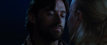 Movie still from “Australia” (2008), directed by Baz Luhrmann – A person with his eyes closed; Close Up shot, Over the shoulder angle