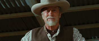 Movie still from “Australia” (2008), directed by Baz Luhrmann – An older man wearing a cowboy hat and a vest; Close Up shot, Low angle