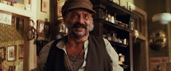 Movie still from “Australia” (2008), directed by Baz Luhrmann – An older man with a beard and a hat; Close Up shot, Low angle