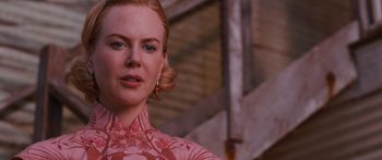 Movie still from “Australia” (2008), directed by Baz Luhrmann – A person wearing a dress; Close Up shot, Over the shoulder angle