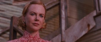 Movie still from “Australia” (2008), directed by Baz Luhrmann – A person wearing a dress; Close Up shot, Over the shoulder angle