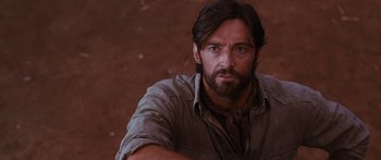 Movie still from “Australia” (2008), directed by Baz Luhrmann – A person wearing a shirt and a tie; Close Up shot, Over the shoulder angle